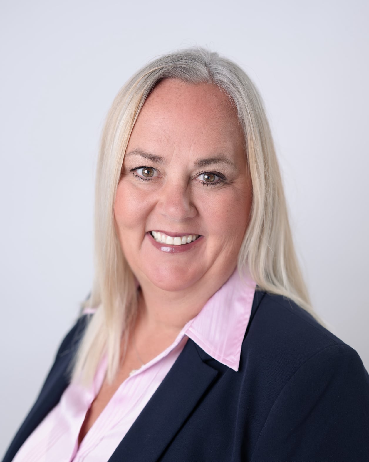 Head shot of Natasha Munkittrick Allen attorney at law in blue suit